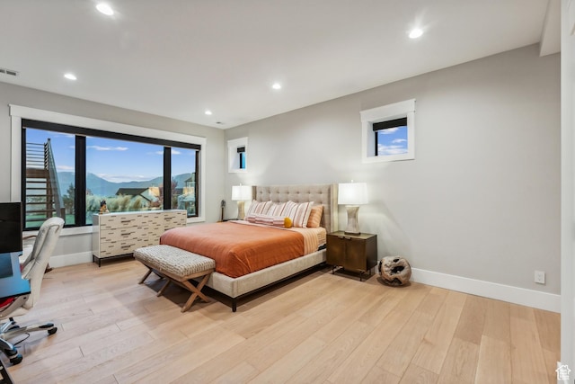 3300 E Hunters Ridge Cir, Heber City, UT 84032 - bedroom featuring light wood-type flooring, baseboards, and recessed lighting