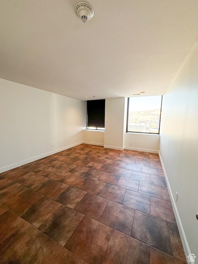 48 W Broadway Unit 2505N, Salt Lake City, UT 84101 - unfurnished room with baseboards