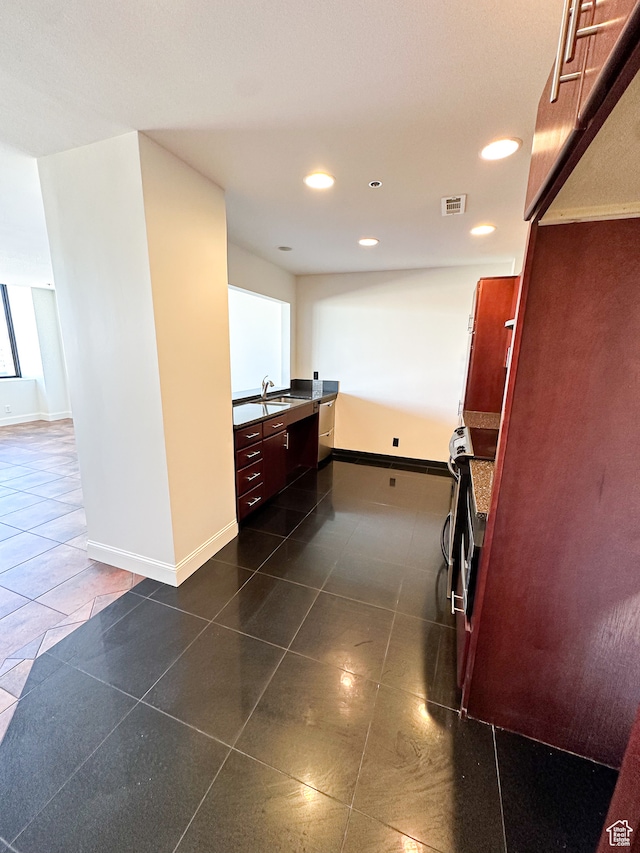48 W Broadway Unit 2505N, Salt Lake City, UT 84101 - kitchen featuring dark tile patterned flooring and sink