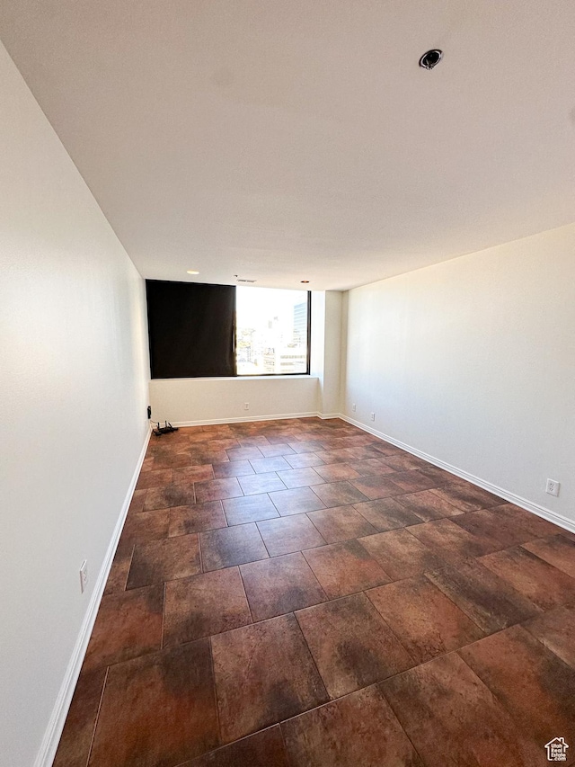48 W Broadway Unit 2505N, Salt Lake City, UT 84101 - spare room featuring baseboards