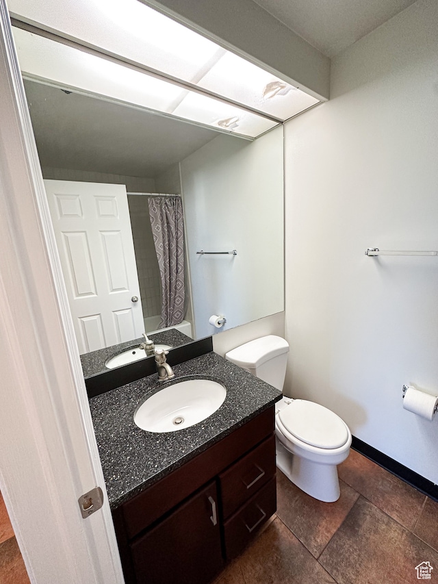 48 W Broadway Unit 2505N, Salt Lake City, UT 84101 - full bathroom with shower / bath combo with shower curtain, tile patterned floors, vanity, and toilet