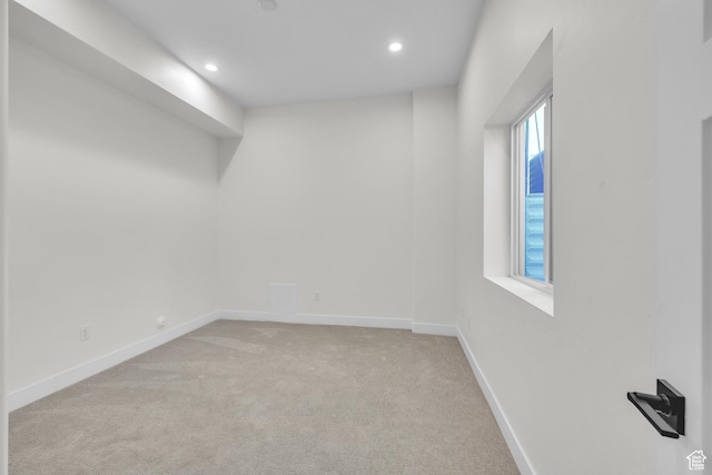 7901 S 2700 E Unit 203, South Weber, UT 84405 - spare room with light colored carpet, baseboards, and recessed lighting