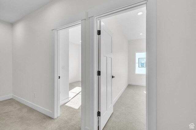 7901 S 2700 E Unit 203, South Weber, UT 84405 - hallway featuring baseboards, recessed lighting, and light colored carpet