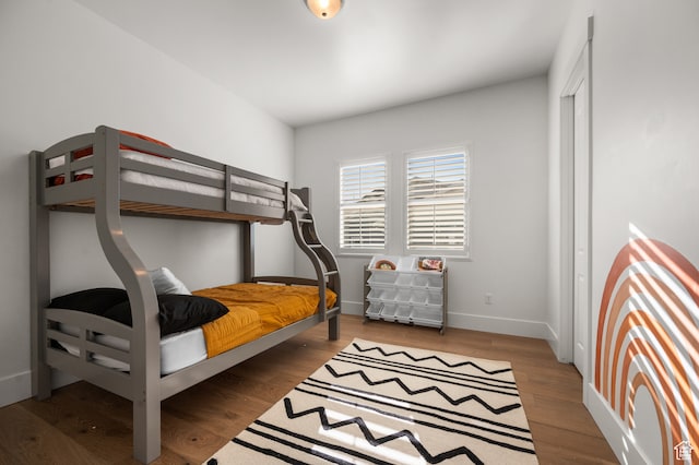 bedroom with hardwood / wood-style floors