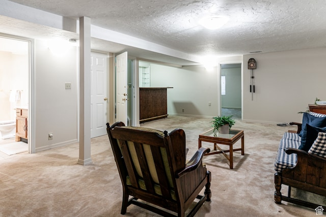 6435 S 1610 E, Murray, UT 84121 - living area with light carpet, a textured ceiling, a bar, and baseboards