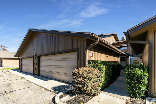6435 S 1610 E, Murray, UT 84121 - view of home's exterior featuring a garage
