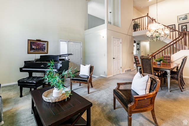 6435 S 1610 E, Murray, UT 84121 - carpeted living room with stairs, baseboards, a high ceiling, and a chandelier