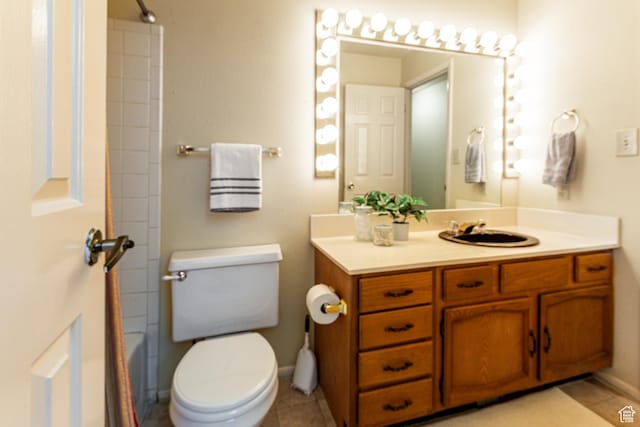 6435 S 1610 E, Murray, UT 84121 - full bathroom with vanity, tile patterned flooring, toilet, and baseboards
