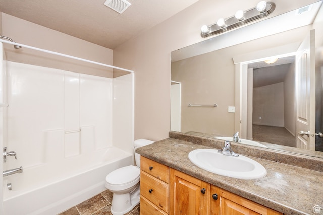 full bathroom with tile patterned flooring, vanity, toilet, and tub / shower combination