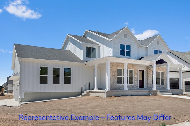 3689 S Riverstone Rd, Mapleton, UT 84664 - view of front facade featuring covered porch, a shingled roof, and board and batten siding