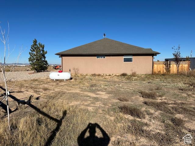 3741 W 5200 N, Cedar City, UT 84721 - view of home's exterior with fence and stucco siding
