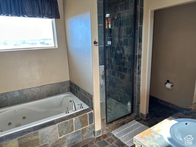 3741 W 5200 N, Cedar City, UT 84721 - bathroom with a shower stall, a tub with jets, vanity, and stone finish flooring