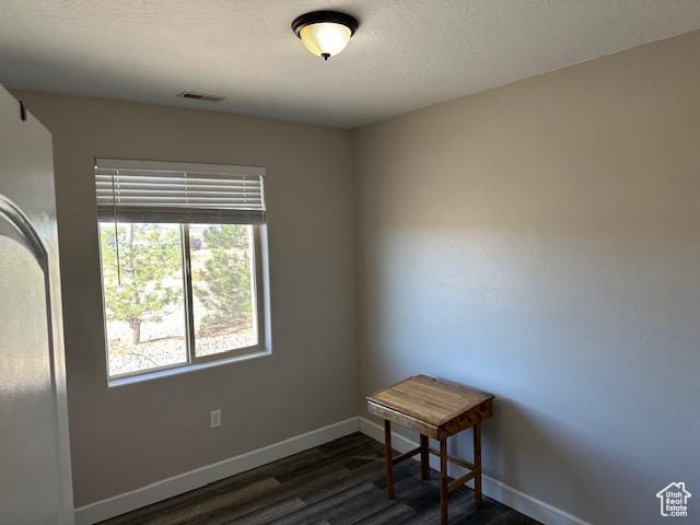 3741 W 5200 N, Cedar City, UT 84721 - spare room featuring dark wood finished floors and baseboards