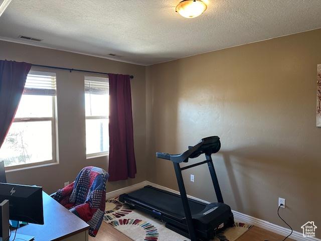 3741 W 5200 N, Cedar City, UT 84721 - workout room with a textured ceiling and baseboards