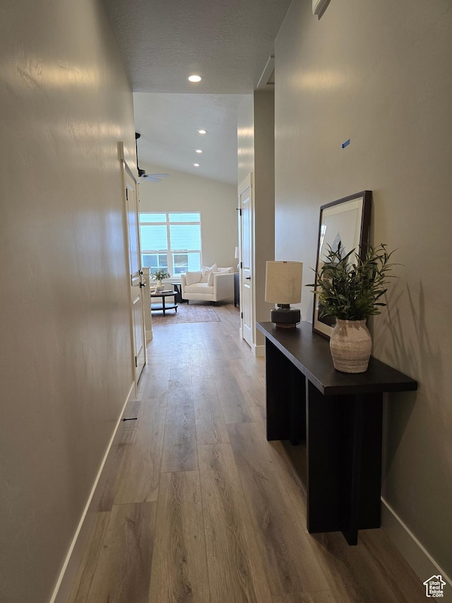 10798 S Haven Landing Dr, South Jordan, UT 84095 - hallway with hardwood / wood-style flooring and vaulted ceiling