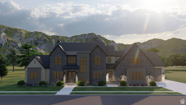 view of front facade with a mountain view and a front yard