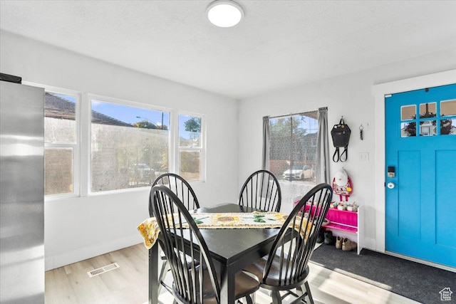 2034 S Laine Ave E, Ogden, UT 84401 - dining room with wood finished floors and baseboards