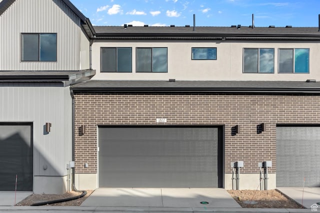 exterior space with a garage