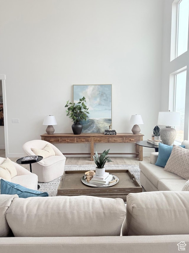 577 N Hawthorn Dr Unit 29, Salem, UT 84653 - living room with baseboards and wood finished floors