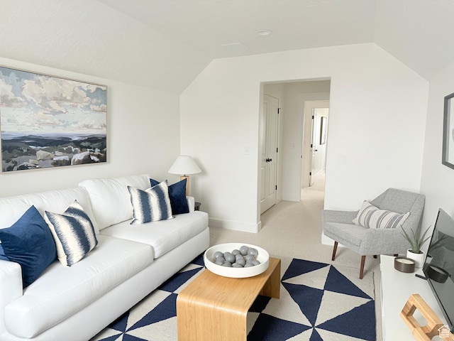577 N Hawthorn Dr Unit 29, Salem, UT 84653 - living area with lofted ceiling, baseboards, and light carpet