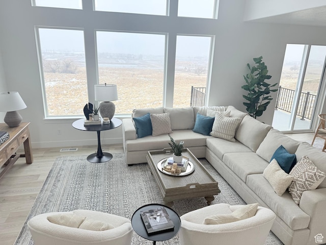 577 N Hawthorn Dr Unit 29, Salem, UT 84653 - living area with light wood finished floors and baseboards