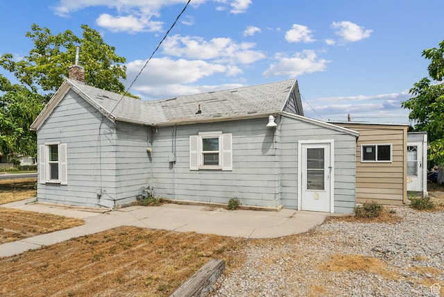 7865 S Main St, Midvale, UT 84047 - rear view of property with a patio