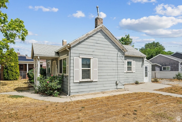 7865 S Main St, Midvale, UT 84047 - view of side of home with a patio area