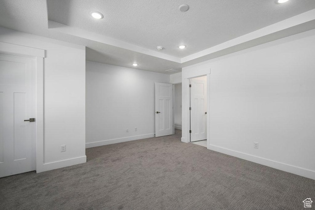 3475 S Perthshire Dr Unit 30, South Salt Lake, UT 84115 - unfurnished bedroom with carpet flooring, baseboards, recessed lighting, and a textured ceiling