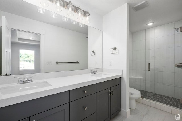 3475 S Perthshire Dr Unit 30, South Salt Lake, UT 84115 - bathroom featuring marble look tiles, toilet, a shower stall, double vanity, and recessed lighting