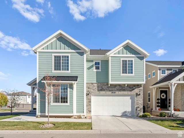 view of front of property featuring a garage