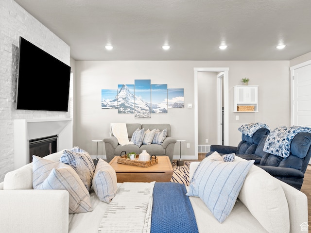 2424 N Lazy J Ln, Lehi, UT 84043 - living room with a fireplace and hardwood / wood-style flooring
