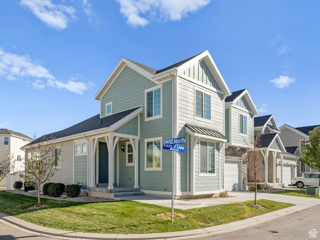 2424 N Lazy J Ln, Lehi, UT 84043 - view of front of house with a garage and a front yard