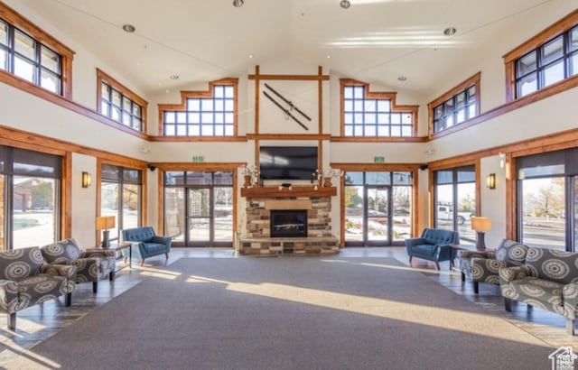 2159 E Bald Eagle Ct S, Draper, UT 84020 - living room featuring a stone fireplace and high vaulted ceiling
