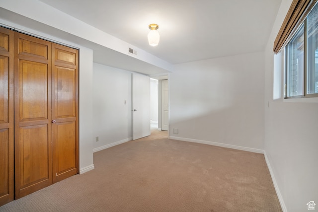 151 S Bernice Way, North Salt Lake, UT 84054 - unfurnished bedroom with light colored carpet and a closet