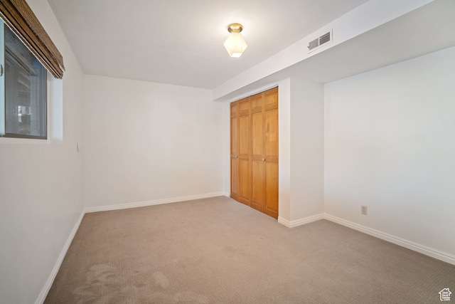 151 S Bernice Way, North Salt Lake, UT 84054 - unfurnished bedroom featuring light colored carpet and a closet