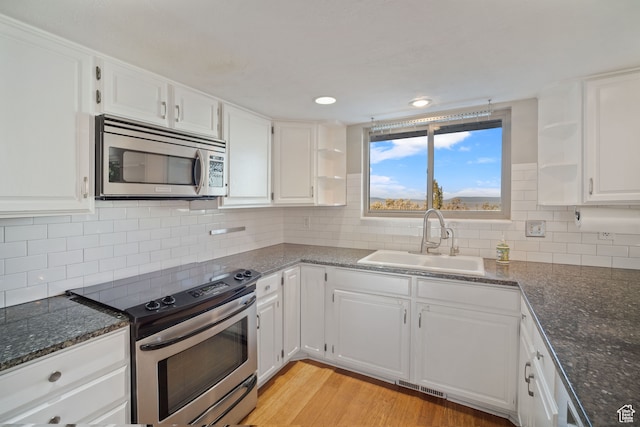151 S Bernice Way, North Salt Lake, UT 84054 - kitchen featuring sink, white cabinets, and appliances with stainless steel finishes