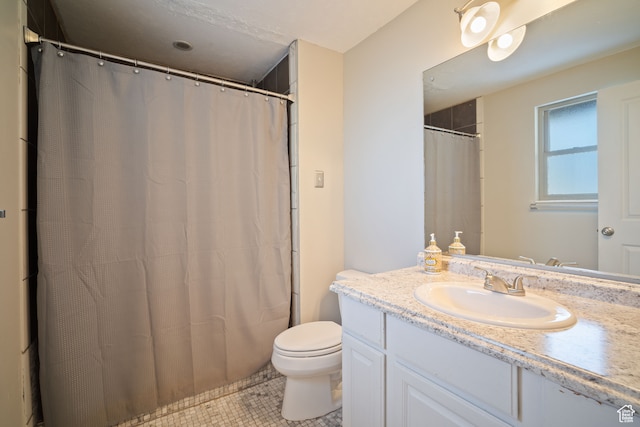 151 S Bernice Way, North Salt Lake, UT 84054 - bathroom with toilet, vanity, and tile patterned flooring