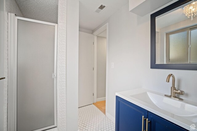 151 S Bernice Way N, Salt Lake, UT 84054 - bathroom with vanity, a shower stall, and baseboards