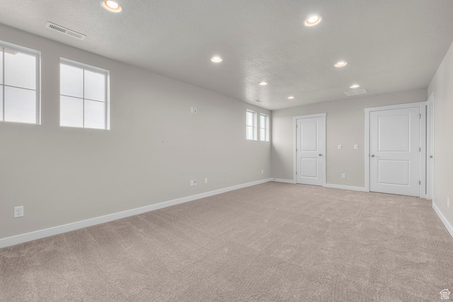 1849 S 2475 W, West Haven, UT 84401 - empty room with light colored carpet and a textured ceiling