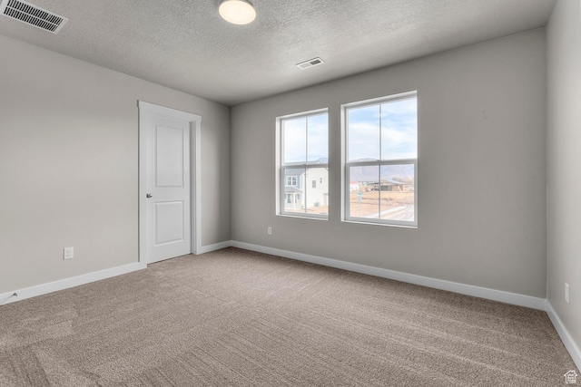 1849 S 2475 W, West Haven, UT 84401 - carpeted empty room featuring a textured ceiling