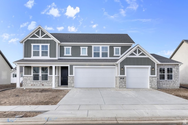 craftsman-style home with a garage