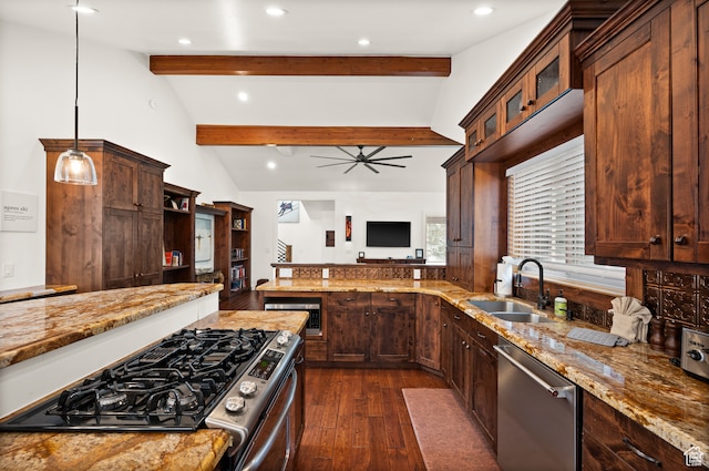 1492 W Meadow Loop Rd Unit 21/22, Snyderville, UT 84098 - kitchen with stainless steel appliances, dark wood-type flooring, sink, lofted ceiling with beams, and hanging light fixtures