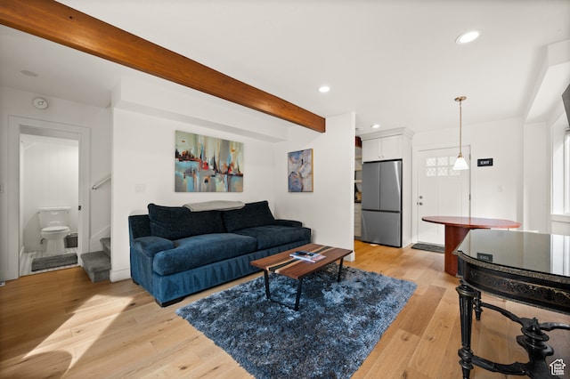 1492 W Meadow Loop Rd Unit 21/22, Snyderville, UT 84098 - living room featuring beamed ceiling and light wood-type flooring