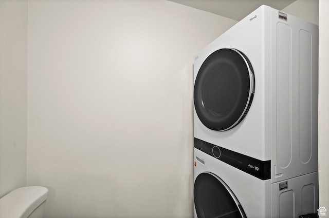 1492 W Meadow Loop Rd Unit 21/22, Snyderville, UT 84098 - washroom with stacked washer and clothes dryer