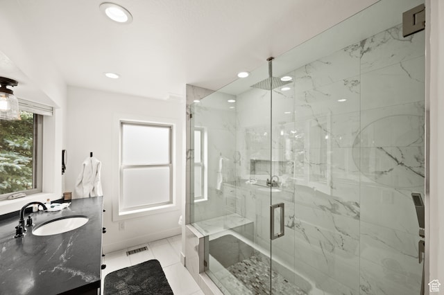 1492 W Meadow Loop Rd Unit 21/22, Snyderville, UT 84098 - bathroom featuring tile patterned floors, vanity, and a shower with door