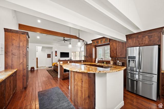 1492 W Meadow Loop Rd Unit 21/22, Snyderville, UT 84098 - kitchen with vaulted ceiling with beams, stainless steel fridge with ice dispenser, dark hardwood / wood-style flooring, and light stone counters