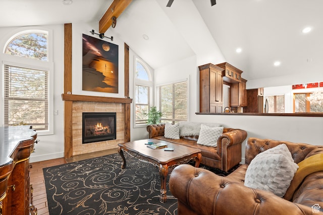 1492 W Meadow Loop Rd Unit 21/22, Snyderville, UT 84098 - living room featuring a tiled fireplace, lofted ceiling with beams, and wood-type flooring