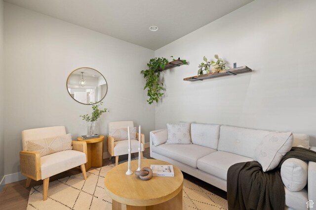 6443 W Early Bird Dr, South Jordan, UT 84009 - living room featuring light wood finished floors and baseboards