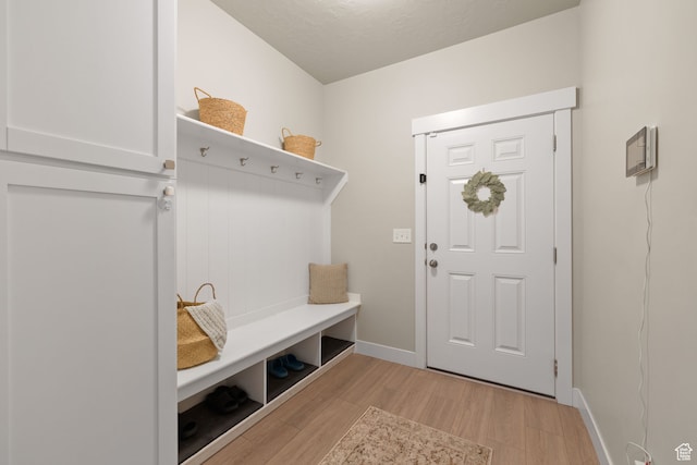 6443 W Early Bird Dr, South Jordan, UT 84009 - mudroom featuring light wood-style flooring and baseboards