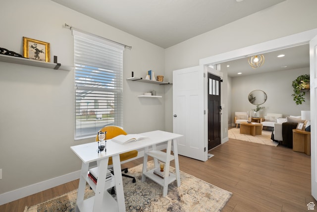 6443 W Early Bird Dr, South Jordan, UT 84009 - home office featuring light wood-style flooring and baseboards